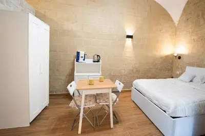 Letto o letti in una camera di Ognibene Nest by Wonderful Italy