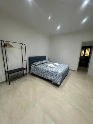 Letto o letti in una camera di Cavallerizza home al museo