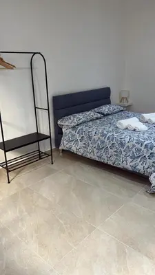 Letto o letti in una camera di Cavallerizza home al museo