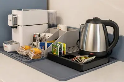 Set per la preparazione di tè e caffè presso Mo' Vediamo rooms
