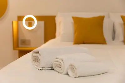 Letto o letti in una camera di Mo' Vediamo rooms