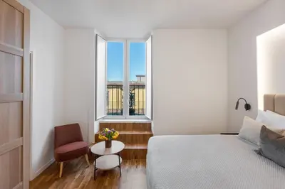 Letto o letti in una camera di Casa Mama - Dimore Partenopee