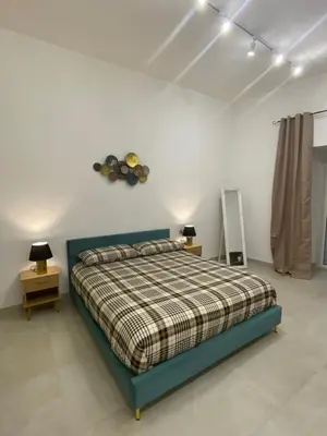 Letto o letti in una camera di Basile House