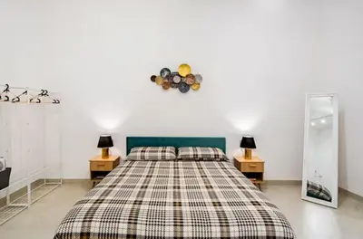 Letto o letti in una camera di Basile House