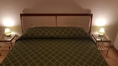 Letto o letti in una camera di Ai Baretti B&B