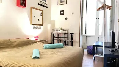 Letto o letti in una camera di Ai Baretti B&B