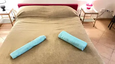 Letto o letti in una camera di Ai Baretti B&B