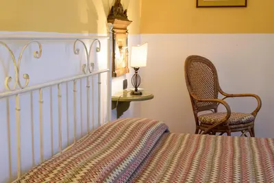 Letto o letti in una camera di Hotel Mergellina