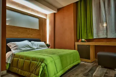 Letto o letti in una camera di Hotel Angioino & Spa