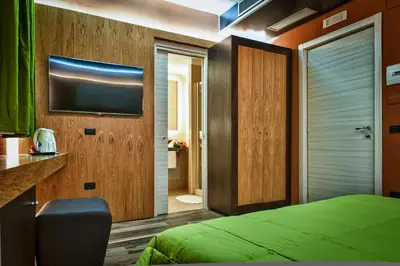 Letto o letti in una camera di Hotel Angioino & Spa