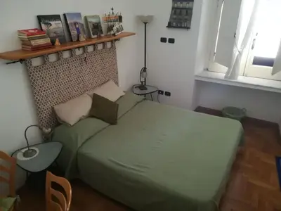 Letto o letti in una camera di B&B Al Ponte