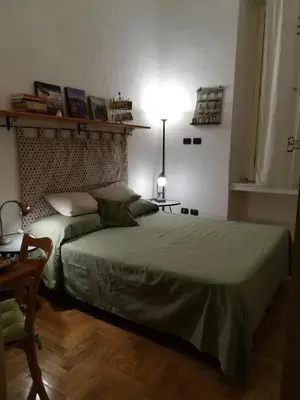 Letto o letti in una camera di B&B Al Ponte