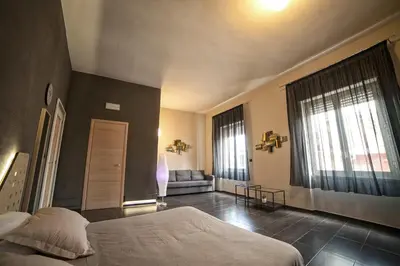 Letto o letti in una camera di Factory Design