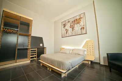 Letto o letti in una camera di Factory Design