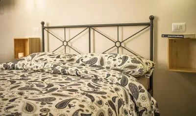 Letto o letti in una camera di San Nicola Apartment