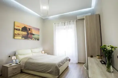 Letto o letti in una camera di Parthenope Suite Rooms Vomero Vanvitelli a 2 min quartieri spagno via Toledo
