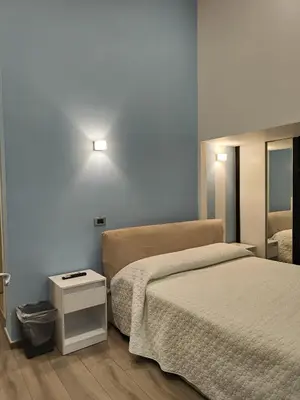 Letto o letti in una camera di Parthenope Suite Rooms Vomero Vanvitelli a 2 min quartieri spagno via Toledo