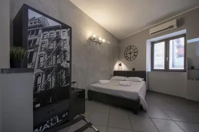 Letto o letti in una camera di Il Taschino Suite