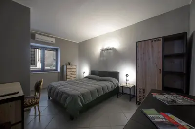 Letto o letti in una camera di Il Taschino Suite
