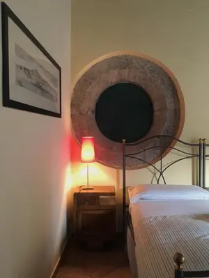 Letto o letti in una camera di B&B Bellini