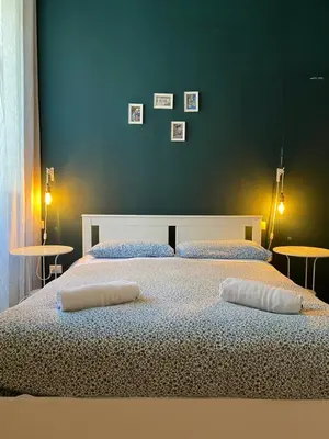 Letto o letti in una camera di B&B La Terrazza Napoli