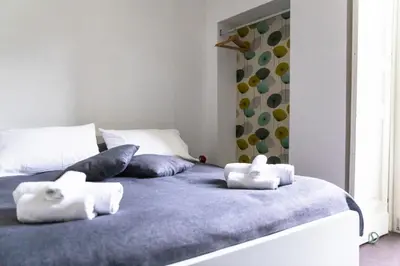 Letto o letti in una camera di Casa Magà