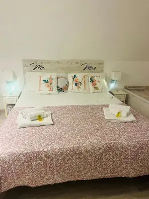 Letto o letti in una camera di Casetta Piazza Plebiscito