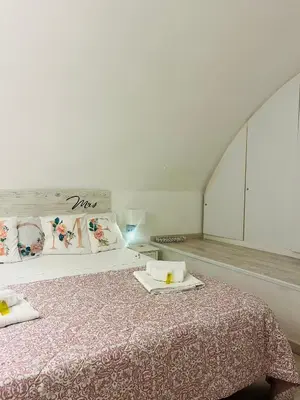 Letto o letti in una camera di Casetta Piazza Plebiscito