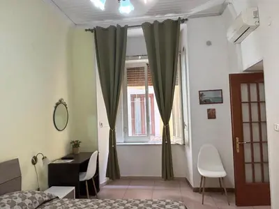 Letto o letti in una camera di Trimarchi House