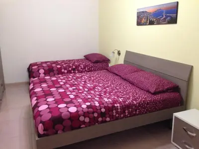 Letto o letti in una camera di Trimarchi House