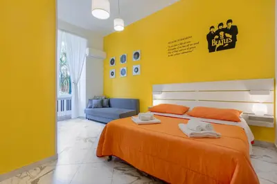 Letto o letti in una camera di Colori e Note
