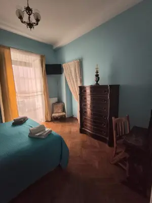 Letto o letti in una camera di Napoli Retro