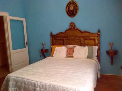 Letto o letti in una camera di Napoli Retro