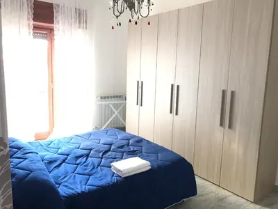 Letto o letti in una camera di Supera Napoli Apartment