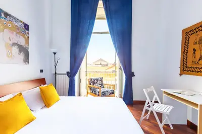 Letto o letti in una camera di B&B Antica Napoli