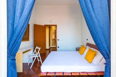 Letto o letti in una camera di B&B Antica Napoli
