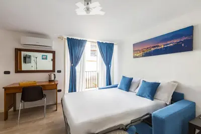 Letto o letti in una camera di B&B Antica Napoli