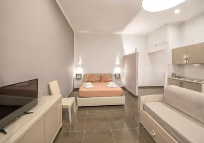 Letto o letti in una camera di Be Italian Flat Bovio