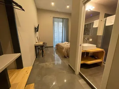 Letto o letti in una camera di Be Italian Flat Bovio