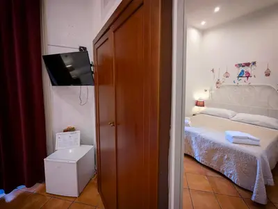 Letto o letti in una camera di Locanda Dell'Arte