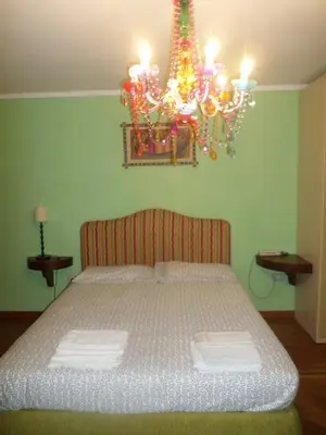 Letto o letti in una camera di b&b Zia Sua
