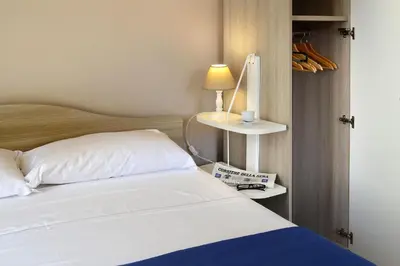 Letto o letti in una camera di B&B Funikuli Funikula