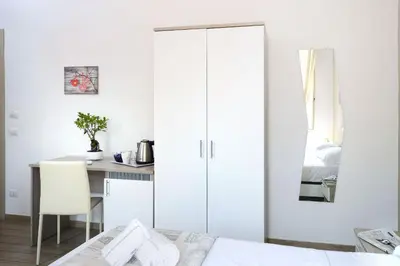 Letto o letti in una camera di B&B Funikuli Funikula