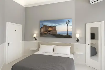 Letto o letti in una camera di Piazza Bovio 22