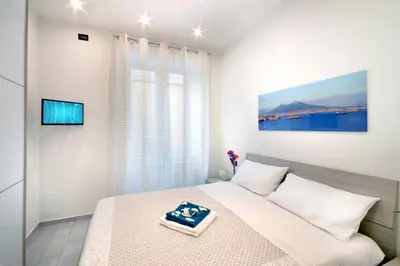 Letto o letti in una camera di Home Sweet Home