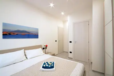 Letto o letti in una camera di Home Sweet Home