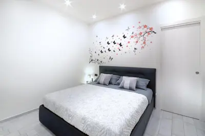 Letto o letti in una camera di Home Sweet Home