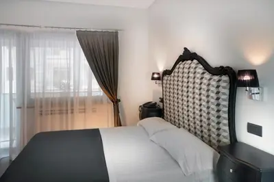 Letto o letti in una camera di Barbarella Suite