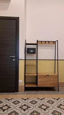 Letto o letti in una camera di Hotel Meublè Santa Chiara Suite