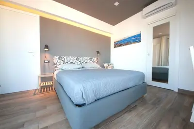 Letto o letti in una camera di Talismano Luxury Suite & Loft & Alcova & Maison
